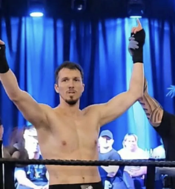 Boxing Coach Dan fight hand raised